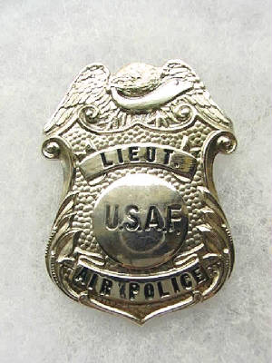 lieu-tair-police-badge1.jpg